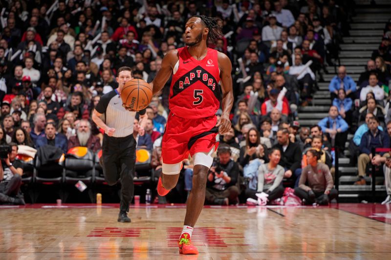 TORONTO, CANADA - JANUARY 17: Immanuel Quickley #5 of the Toronto Raptors dribbles the ball during the game against the Miami Heat on January 17, 2024 at the Scotiabank Arena in Toronto, Ontario, Canada.  NOTE TO USER: User expressly acknowledges and agrees that, by downloading and or using this Photograph, user is consenting to the terms and conditions of the Getty Images License Agreement.  Mandatory Copyright Notice: Copyright 2024 NBAE (Photo by Mark Blinch/NBAE via Getty Images)