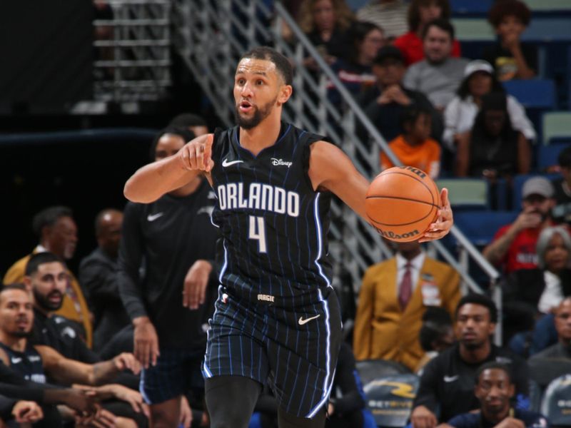 NEW ORLEANS, LA - OCTOBER 10: Jalen Suggs #4 of the Orlando Magic brings the ball up court against the New Orleans Pelicans on October 10, 2023 at the Smoothie King Center in New Orleans, Louisiana. NOTE TO USER: User expressly acknowledges and agrees that, by downloading and or using this Photograph, user is consenting to the terms and conditions of the Getty Images License Agreement. Mandatory Copyright Notice: Copyright 2023 NBAE (Photo by Layne Murdoch Jr./NBAE via Getty Images)