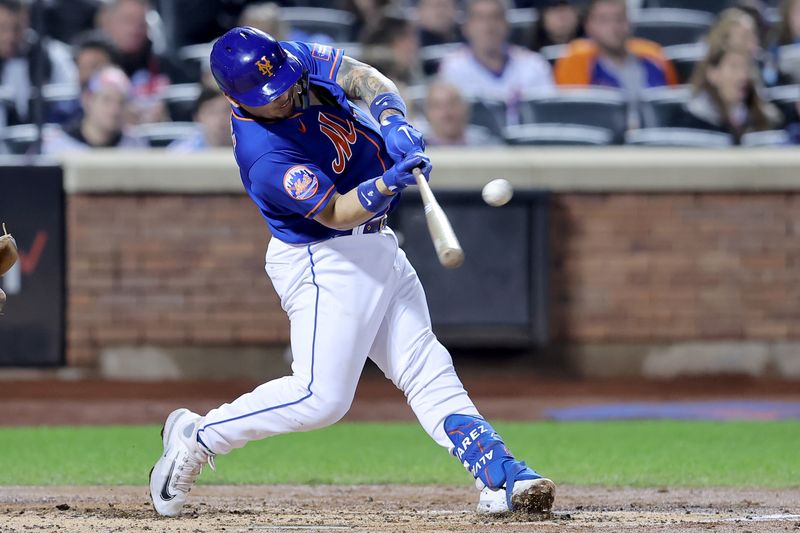 Sep 30, 2023; New York City, New York, USA; New York Mets catcher Francisco Alvarez (4) hits a two run home run against the Philadelphia Phillies during the second inning at Citi Field. Mandatory Credit: Brad Penner-USA TODAY Sports