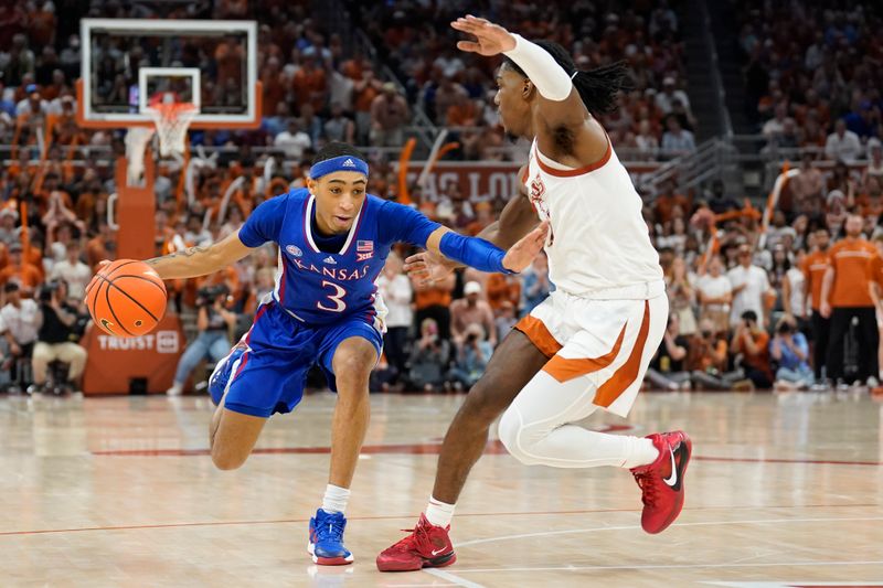 Mar 4, 2023; Austin, Texas, USA; Kansas Jayhawks guard Dajuan Harris Jr. (3) drives to the basket against Texas Longhorns guard Marcus Carr (5) during the second half at Moody Center. Mandatory Credit: Scott Wachter-USA TODAY Sports