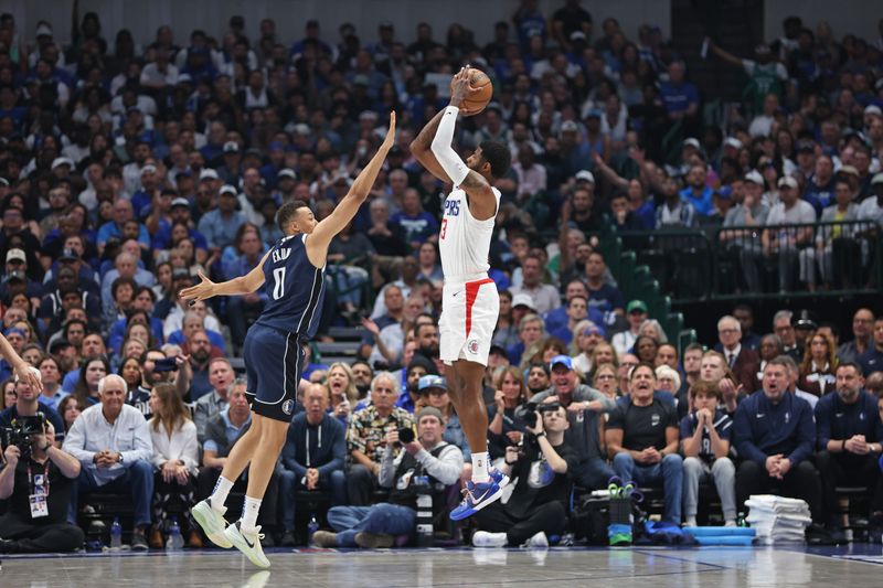 DALLAS, TX - APRIL 28: Paul George #13 of the LA Clippers shoots the ball during the game against the Dallas Mavericks during Round 1 Game 4 of the 2024 NBA Playoffs on April 28, 2024 at the American Airlines Center in Dallas, Texas. NOTE TO USER: User expressly acknowledges and agrees that, by downloading and or using this photograph, User is consenting to the terms and conditions of the Getty Images License Agreement. Mandatory Copyright Notice: Copyright 2024 NBAE (Photo by Tim Heitman/NBAE via Getty Images)