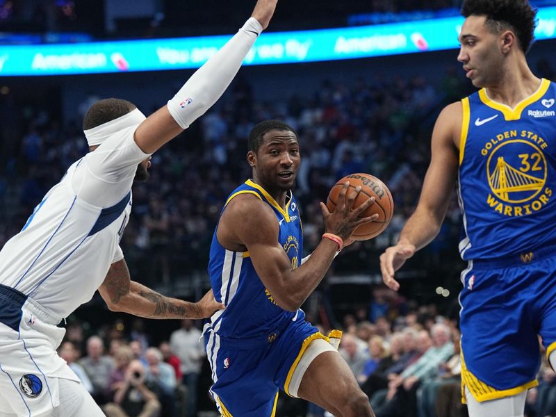 DALLAS, TX - MARCH 13: Jonathan Kuminga #00 of the Golden State Warriors drives to the basket during the game against the Dallas Mavericks on March 13, 2024 at the American Airlines Center in Dallas, Texas. NOTE TO USER: User expressly acknowledges and agrees that, by downloading and or using this photograph, User is consenting to the terms and conditions of the Getty Images License Agreement. Mandatory Copyright Notice: Copyright 2024 NBAE (Photo by Glenn James/NBAE via Getty Images)