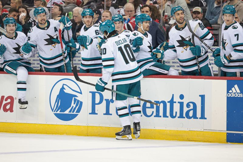 Dec 1, 2023; Newark, New Jersey, USA; San Jose Sharks left wing Anthony Duclair (10) celebrates his goal with teammates during the second period against the New Jersey Devils at Prudential Center. Mandatory Credit: Vincent Carchietta-USA TODAY Sports