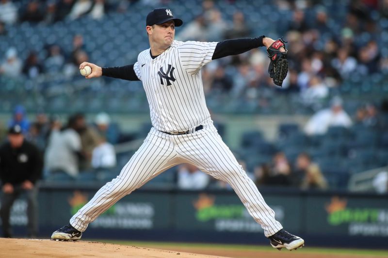 May 2, 2023; Bronx, New York, USA;  New York Yankees starting pitcher Gerrit Cole (45) pitches in the first inning against the against the Cleveland Guardians at Yankee Stadium. Mandatory Credit: Wendell Cruz-USA TODAY Sports