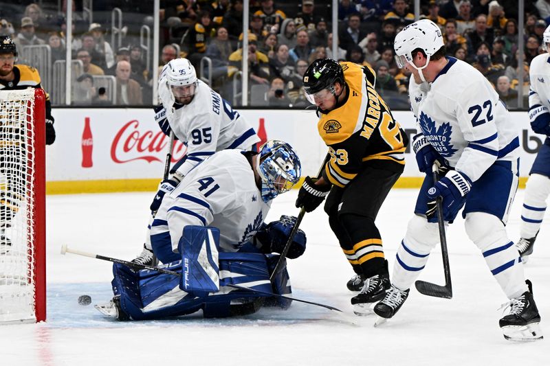 Feb 25, 2025; Boston, Massachusetts, USA; Boston Bruins left wing Brad Marchand (63) scores a goal against Toronto Maple Leafs goaltender Anthony Stolarz (41) during the first period at the TD Garden. Mandatory Credit: Brian Fluharty-Imagn Images