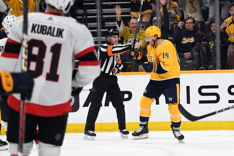 Feb 27, 2024; Nashville, Tennessee, USA; Nashville Predators center Gustav Nyquist (14) celebrates after a goal during the third period against the Ottawa Senators at Bridgestone Arena. Mandatory Credit: Christopher Hanewinckel-USA TODAY Sports