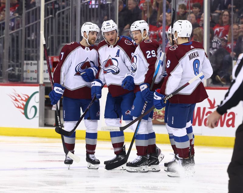 Feb 6, 2024; Newark, New Jersey, USA; Colorado Avalanche right wing Mikko Rantanen (96) celebrates his goal against the New Jersey Devils during the first period at Prudential Center. Mandatory Credit: Ed Mulholland-USA TODAY Sports