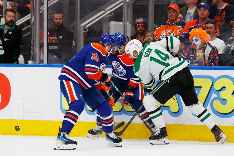 May 29, 2024; Edmonton, Alberta, CAN;Edmonton Oilers forward Corey Perry (90) and Dallas Stars forward Jamie Benn (14) battle along the boards for a loose puck during the first period in game four of the Western Conference Final of the 2024 Stanley Cup Playoffs at Rogers Place. Mandatory Credit: Perry Nelson-USA TODAY Sports