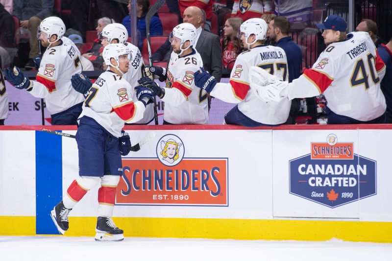 Jan 10, 2026; Ottawa, Ontario, CAN; Florida Panthers center Evan Rodrigues (17) celebrates with team his goal scored in the first period against the Ottawa Senators at the Canadian Tire Centre. Mandatory Credit: Marc DesRosiers-IMAGN Images
