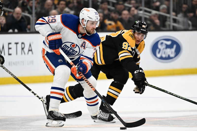 Mar 9, 2023; Boston, Massachusetts, USA; Edmonton Oilers center Leon Draisaitl (29) controls the puck against Boston Bruins left wing Tomas Nosek (92) during the first period at the TD Garden. Mandatory Credit: Brian Fluharty-USA TODAY Sports