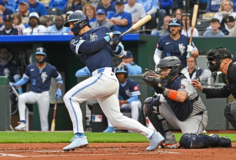 Apr 25, 2025; Kansas City, Missouri, USA;  Kansas City Royals shortstop Bobby Witt Jr. (7) singles in the first inning against the Houston Astros at Kauffman Stadium. Mandatory Credit: Peter Aiken-Imagn Images