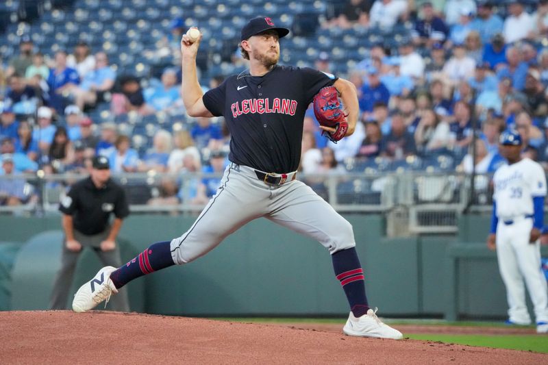 Sep 3, 2024; Kansas City, Missouri, USA; Cleveland Guardians starting pitcher Tanner Bibee (28) delivers a pitch against the Kansas City Royals in the first inning at Kauffman Stadium. Mandatory Credit: Denny Medley-Imagn Images