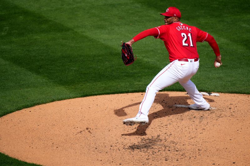 Feb 25, 2024;  Goodyear, Ariz USA; Cincinnati Reds starting pitcher Hunter Greene (21) delivers a pitch in the second inning during a MLB spring training baseball game against the Los Angeles Angelsat Goodyear Ballpark. Mandatory Credit: Kareem Elgazzar-USA TODAY Sports via The Cincinnati Enquirer