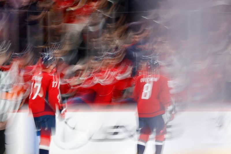 Nov 13, 2024; Washington, District of Columbia, USA; Washington Capitals center Dylan Strome (17) celebrates with teammates after scoring a goal against the Toronto Maple Leafs in the first period at Capital One Arena. Mandatory Credit: Geoff Burke-Imagn Images