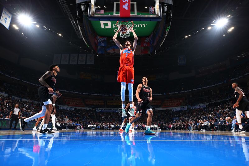 OKLAHOMA CITY, OK - JANUARY 23: Chet Holmgren #7 of the Oklahoma City Thunder dunks the ball during the game against the Portland Trail Blazers on January 23, 2024 at Paycom Arena in Oklahoma City, Oklahoma. NOTE TO USER: User expressly acknowledges and agrees that, by downloading and or using this photograph, User is consenting to the terms and conditions of the Getty Images License Agreement. Mandatory Copyright Notice: Copyright 2024 NBAE (Photo by Zach Beeker/NBAE via Getty Images)