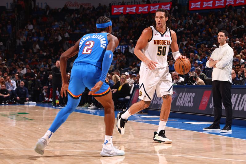 OKLAHOMA CITY, OK - JANUARY 31: Aaron Gordon #50 of the Denver Nuggets dribbles the ball during the game against the Oklahoma City Thunder on January 31, 2024 at Paycom Arena in Oklahoma City, Oklahoma. NOTE TO USER: User expressly acknowledges and agrees that, by downloading and or using this photograph, User is consenting to the terms and conditions of the Getty Images License Agreement. Mandatory Copyright Notice: Copyright 2024 NBAE (Photo by Zach Beeker/NBAE via Getty Images)