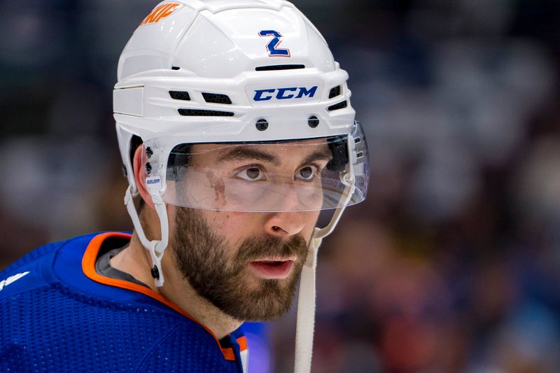 May 16, 2024; Vancouver, British Columbia, CAN; Edmonton Oilers defenseman Evan Bouchard (2) handles the puck in warm up prior to game five of the second round of the 2024 Stanley Cup Playoffs against the Vancouver Canucks at Rogers Arena. Mandatory Credit: Bob Frid-USA TODAY Sports