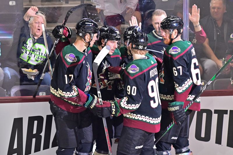 Nov 7, 2023; Tempe, Arizona, USA; Arizona Coyotes left wing Matias Maccelli (63) celebrates with center Nick Bjugstad (17), defenseman J.J. Moser (90), left wing Lawson Crouse (67) and defenseman Sean Durzi (50)after scoring a goal in the first period against the Seattle Kraken at Mullett Arena. Mandatory Credit: Matt Kartozian-USA TODAY Sports