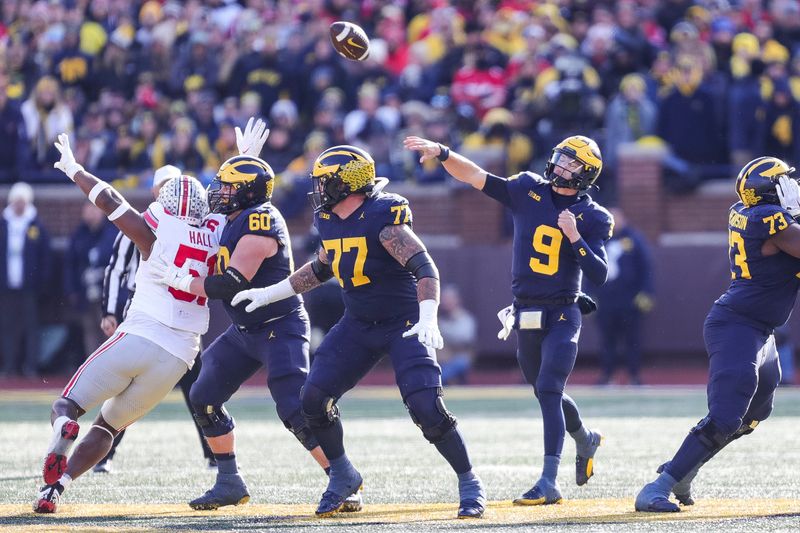 Nov 25, 2023; Ann Arbor, MI, USA;  Michigan quarterback J.J. McCarthy makes a pass against Ohio State during the first half at Michigan Stadium in Ann Arbor on Saturday, Nov. 25, 2023. Mandatory Credit: Junfu Han-USA TODAY Sports