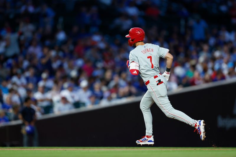 Jul 2, 2024; Chicago, Illinois, USA; Philadelphia Phillies shortstop Trea Turner (7) rounds the bases after hitting a two-run home run against the Chicago Cubs during the fifth inning at Wrigley Field. Mandatory Credit: Kamil Krzaczynski-USA TODAY Sports