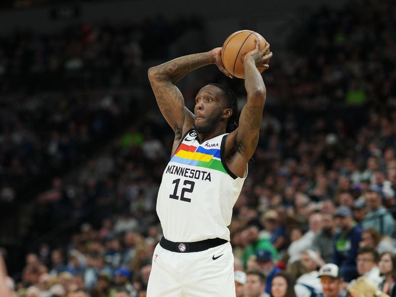 MINNEAPOLIS, MN -  APRIL 2: Taurean Prince #12 of the Minnesota Timberwolves looks to pass the ball during the game against the Portland Trail Blazers on April 2, 2023 at Target Center in Minneapolis, Minnesota. NOTE TO USER: User expressly acknowledges and agrees that, by downloading and or using this Photograph, user is consenting to the terms and conditions of the Getty Images License Agreement. Mandatory Copyright Notice: Copyright 2023 NBAE (Photo by Jordan Johnson/NBAE via Getty Images)