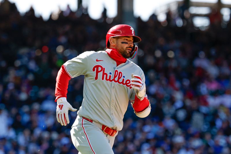 Apr 26, 2025; Chicago, Illinois, USA; Philadelphia Phillies right fielder Nick Castellanos (8) runs after hitting a single against the Chicago Cubs during the fourth inning at Wrigley Field. Mandatory Credit: Kamil Krzaczynski-Imagn Images