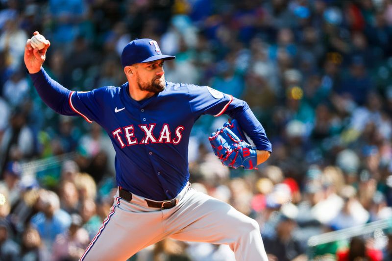 Apr 13, 2025; Seattle, Washington, USA; Texas Rangers starting pitcher Nathan Eovaldi (17) throws against the Seattle Mariners during the first inning at T-Mobile Park. Mandatory Credit: Joe Nicholson-Imagn Images