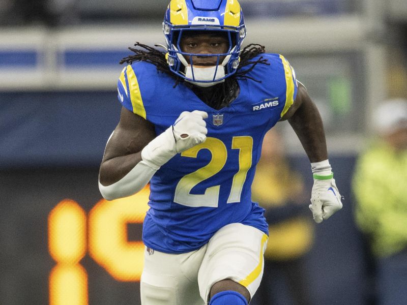 Los Angeles Rams running back Zach Evans (21) runs during an NFL football game against the Washington Commanders, Sunday, Dec. 17, 2023, in Inglewood, Calif. (AP Photo/Kyusung Gong)