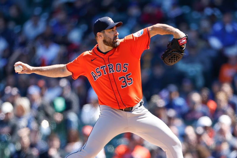 Apr 25, 2024; Chicago, Illinois, USA; Houston Astros starting pitcher Justin Verlander (35) delivers a pitch against the Chicago Cubs during the first inning at Wrigley Field. Mandatory Credit: Kamil Krzaczynski-USA TODAY Sports