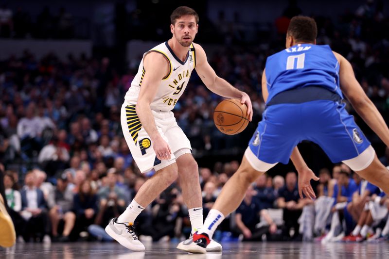 DALLAS, TEXAS - MARCH 05: T.J. McConnell #9 of the Indiana Pacers dribbles the ball against Dante Exum #0 of the Dallas Mavericks in the second half at American Airlines Center on March 05, 2024 in Dallas, Texas. NOTE TO USER: User expressly acknowledges and agrees that, by downloading and or using this photograph, User is consenting to the terms and conditions of the Getty Images License Agreement. (Photo by Tim Heitman/Getty Images)