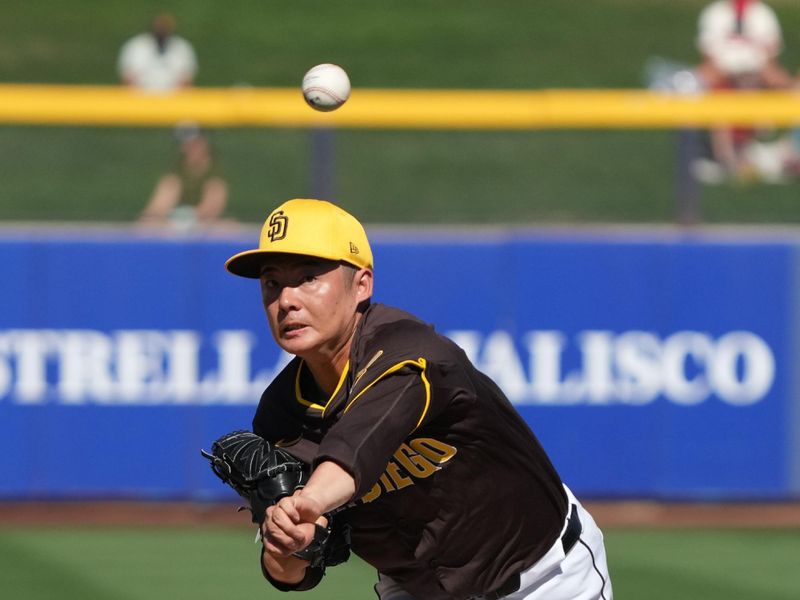 Feb 25, 2025; Peoria, Arizona, USA; San Diego Padres pitcher Yuki Matsui (1) throws against the Los Angeles Angels during the fifth inning at Peoria Sports Complex. Mandatory Credit: Rick Scuteri-Imagn Images