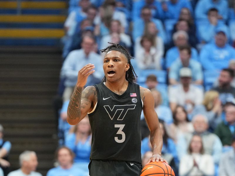 Feb 28, 2026; Chapel Hill, North Carolina, USA; Virginia Tech Hokies guard Ben Hammond (3) brings the ball up the court in the first half at Dean E. Smith Center. Mandatory Credit: Bob Donnan-Imagn Images