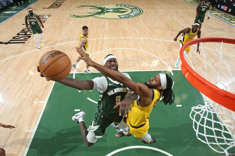 MILWAUKEE, WI - APRIL 21: Bobby Portis #9 of the Milwaukee Bucks drives to the basket during the game against the Indiana Pacers during Round 1 Game 1 of the 2024 NBA Playoffs on April 21, 2024 at the Fiserv Forum Center in Milwaukee, Wisconsin. NOTE TO USER: User expressly acknowledges and agrees that, by downloading and or using this Photograph, user is consenting to the terms and conditions of the Getty Images License Agreement. Mandatory Copyright Notice: Copyright 2024 NBAE (Photo by Gary Dineen/NBAE via Getty Images).