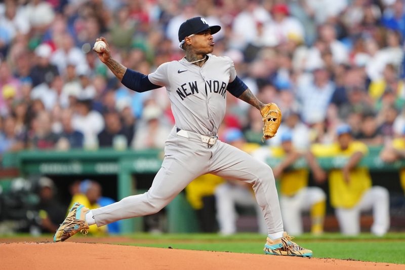 Jul 27, 2024; Boston, Massachusetts, USA; New York Yankees pitcher Marcus Stroman (0) delivers a pitch against the Boston Red Sox during the first inning at Fenway Park. Mandatory Credit: Gregory Fisher-USA TODAY Sports