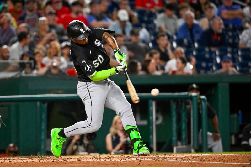 Sep 26, 2025; Washington, District of Columbia, USA; Chicago White Sox first baseman Lenyn Sosa (50) hits a RBI double against the Washington Nationals during the fifth inning at Nationals Park. Mandatory Credit: Brad Mills-Imagn Images