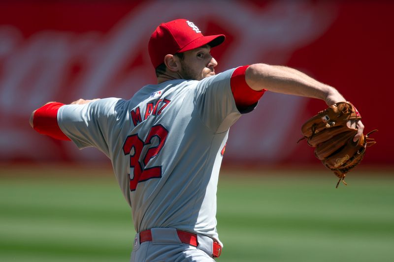 Apr 17, 2024; Oakland, California, USA; St. Louis Cardinals starting pitcher Steven Matz (32) delivers a pitch against the Oakland Athletics during the first inning at Oakland-Alameda County Coliseum. Mandatory Credit: D. Ross Cameron-USA TODAY Sports
