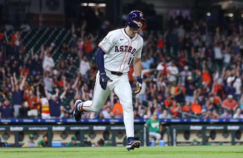 May 16, 2024; Houston, Texas, USA; Houston Astros left fielder Joey Loperfido (10) reacts after hitting the first home run of his major league career during the third inning against the Oakland Athletics at Minute Maid Park. Mandatory Credit: Troy Taormina-USA TODAY Sports