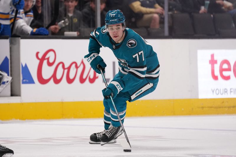 Mar 6, 2026; San Jose, California, USA; San Jose Sharks center Michael Misa (77) controls the puck against the St. Louis Blues in the second period at SAP Center at San Jose. Mandatory Credit: David Gonzales-Imagn Images