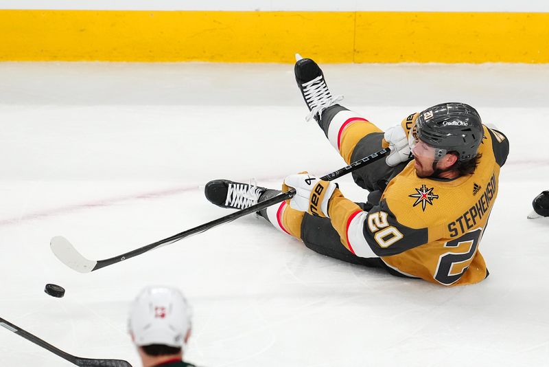 Apr 12, 2024; Las Vegas, Nevada, USA; Vegas Golden Knights center Chandler Stephenson (20) controls the puck against the Minnesota Wild during the third period at T-Mobile Arena. Mandatory Credit: Stephen R. Sylvanie-USA TODAY Sports