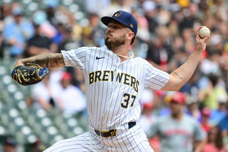 Aug 11, 2024; Milwaukee, Wisconsin, USA;  Milwaukee Brewers starting pitcher DL Hall (37) pitches in the first inning against the Cincinnati Reds at American Family Field. Mandatory Credit: Benny Sieu-USA TODAY Sports