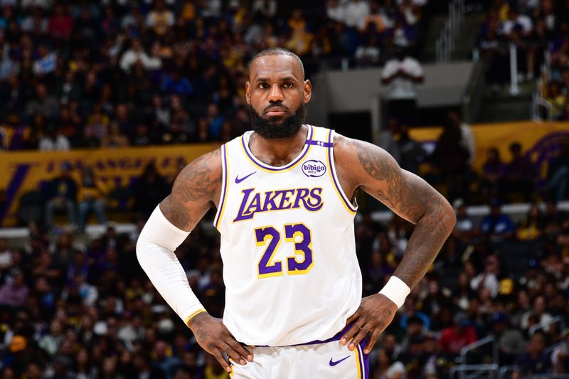 LOS ANGELES, CA - OCTOBER 26: LeBron James #23 of the Los Angeles Lakers looks on during the game against the Sacramento Kings on October 26, 2024 at Crypto.Com Arena in Los Angeles, California. NOTE TO USER: User expressly acknowledges and agrees that, by downloading and/or using this Photograph, user is consenting to the terms and conditions of the Getty Images License Agreement. Mandatory Copyright Notice: Copyright 2024 NBAE (Photo by Adam Pantozzi/NBAE via Getty Images)