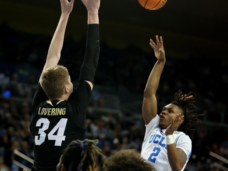 Jan 14, 2023; Los Angeles, California, USA; UCLA Bruins guard Dylan Andrews (2) shoots the ball over Colorado Buffaloes center Lawson Lovering (34) during the second half at Pauley Pavilion presented by Wescom. Mandatory Credit: Kiyoshi Mio-USA TODAY Sports