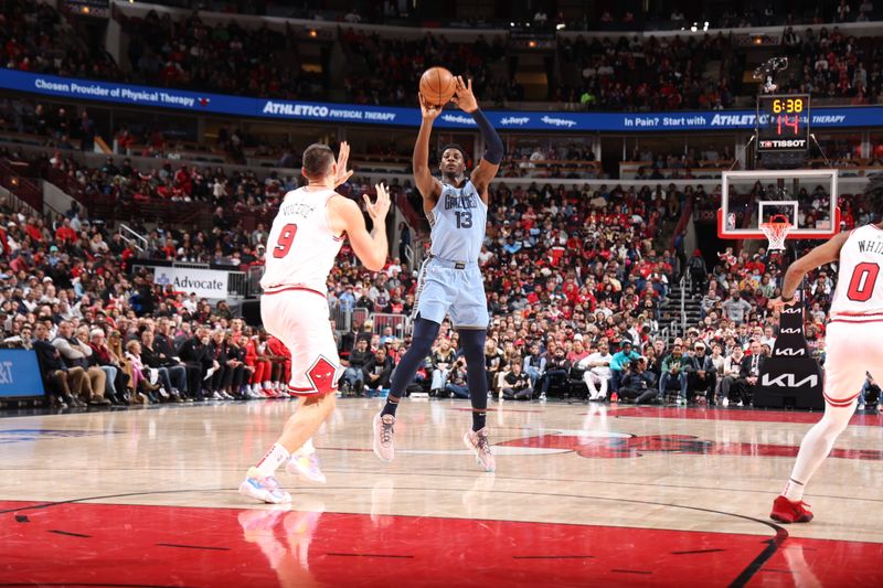 CHICAGO, IL - APRIL 2: Jaren Jackson Jr. #13 of the Memphis Grizzlies shoots a three point basket during the game against the Chicago Bulls on April 2, 2023 at United Center in Chicago, Illinois. NOTE TO USER: User expressly acknowledges and agrees that, by downloading and or using this photograph, User is consenting to the terms and conditions of the Getty Images License Agreement. Mandatory Copyright Notice: Copyright 2023 NBAE (Photo by Jeff Haynes/NBAE via Getty Images)