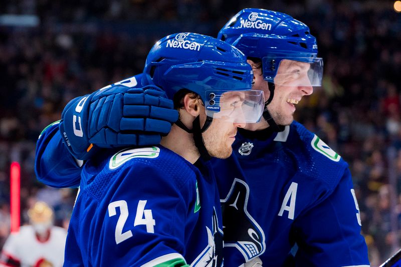 Jan 2, 2024; Vancouver, British Columbia, CAN; Vancouver Canucks forward Pius Suter (24) and forward J.T. Miller (9) celebrate Suter   s second goal of the game against the Ottawa Senators in the third period at Rogers Arena. Mandatory Credit: Bob Frid-USA TODAY Sports