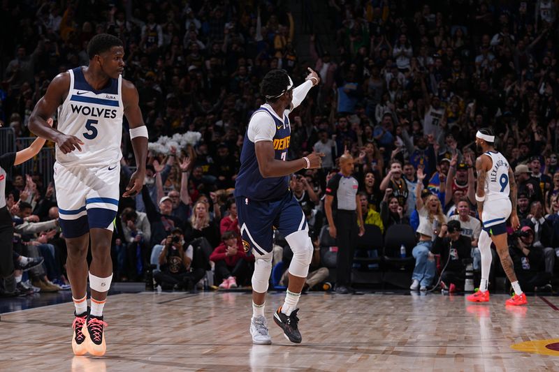 DENVER, CO - APRIL 10: Reggie Jackson #7 of the Denver Nuggets celebrates during the game against the Minnesota Timberwolves on April 10, 2024 at the Ball Arena in Denver, Colorado. NOTE TO USER: User expressly acknowledges and agrees that, by downloading and/or using this Photograph, user is consenting to the terms and conditions of the Getty Images License Agreement. Mandatory Copyright Notice: Copyright 2024 NBAE (Photo by Bart Young/NBAE via Getty Images)