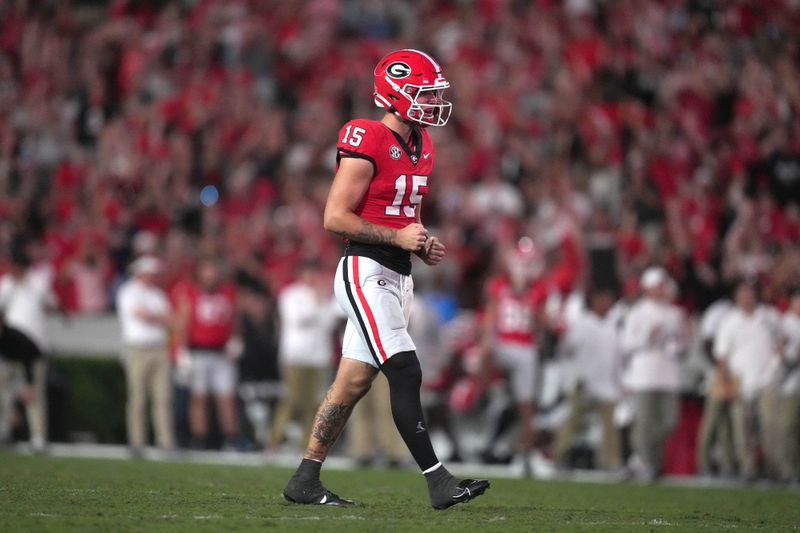 Sep 23, 2023; Athens, Georgia, USA; Georgia Bulldogs quarterback Carson Beck (15) reacts after a touchdown against the UAB Blazers in the second half at Sanford Stadium. Mandatory Credit: Kirby Lee-USA TODAY Sports