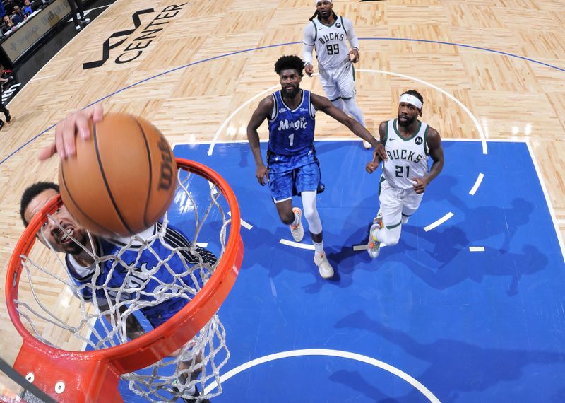 ORLANDO, FL - APRIL 14: Cole Anthony #50 of the Orlando Magic dunks the ball during the game against the Milwaukee Bucks on April 14, 2024 at Kia Center in Orlando, Florida. NOTE TO USER: User expressly acknowledges and agrees that, by downloading and or using this photograph, User is consenting to the terms and conditions of the Getty Images License Agreement. Mandatory Copyright Notice: Copyright 2024 NBAE (Photo by Fernando Medina/NBAE via Getty Images)