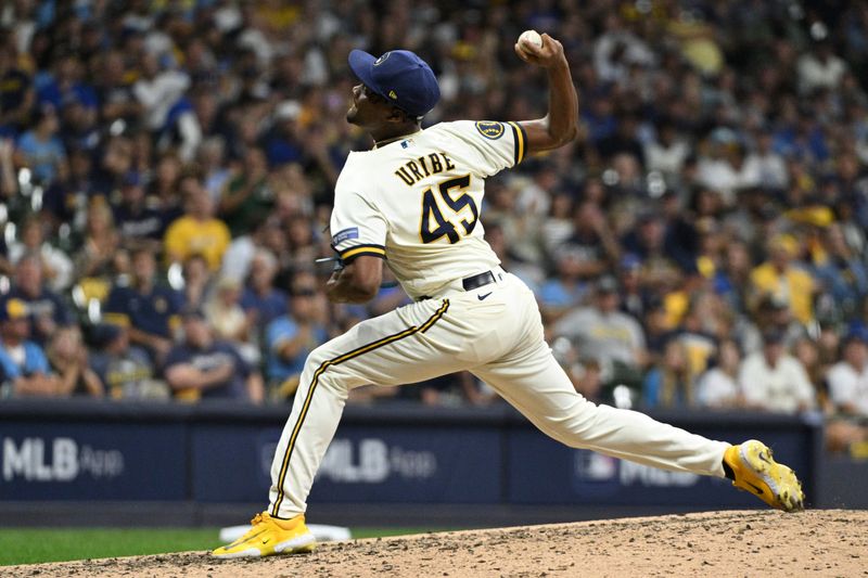 Oct 3, 2023; Milwaukee, Wisconsin, USA; Milwaukee Brewers relief pitcher Abner Uribe (45) pitches in the fifth inning against the Arizona Diamondbacks during game one of the Wildcard series for the 2023 MLB playoffs at American Family Field. Mandatory Credit: Michael McLoone-USA TODAY Sports