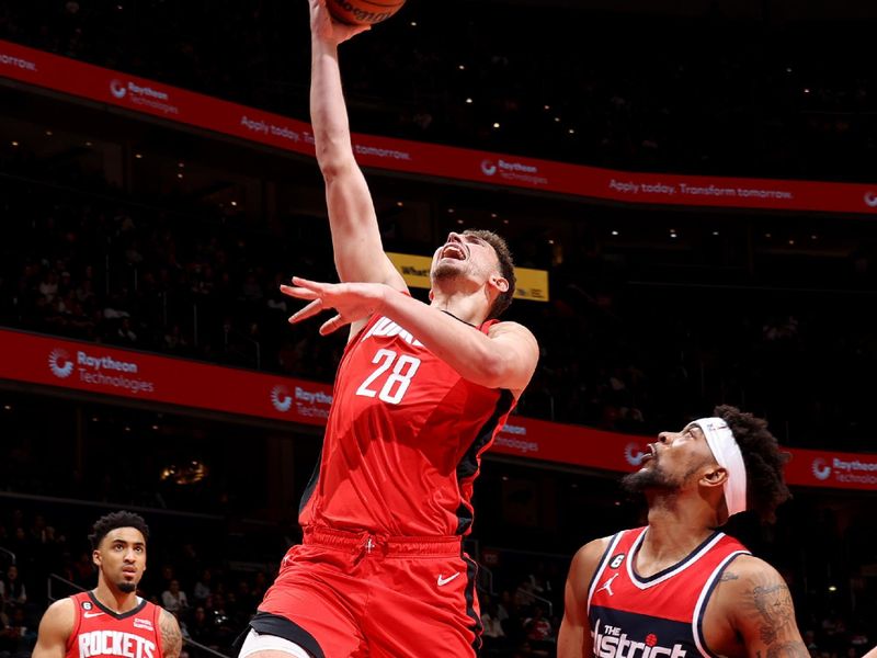 WASHINGTON, DC -? APRIL 9: Alperen Sengun #28 of the Houston Rockets drives to the basket against the Washington Wizards  on April 9, 2023 at Capital One Arena in Washington, DC. NOTE TO USER: User expressly acknowledges and agrees that, by downloading and or using this Photograph, user is consenting to the terms and conditions of the Getty Images License Agreement. Mandatory Copyright Notice: Copyright 2023 NBAE (Photo by Stephen Gosling/NBAE via Getty Images)