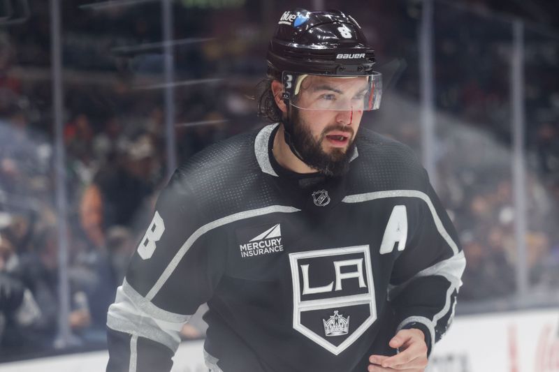 Oct 14, 2023; Los Angeles, California, USA; Los Angeles Kings Defensemen Drew Doughty (8) leaves the ice after a hit during the third period at Crypto.com Arena. Mandatory Credit: Yannick Peterhans-USA TODAY Sports